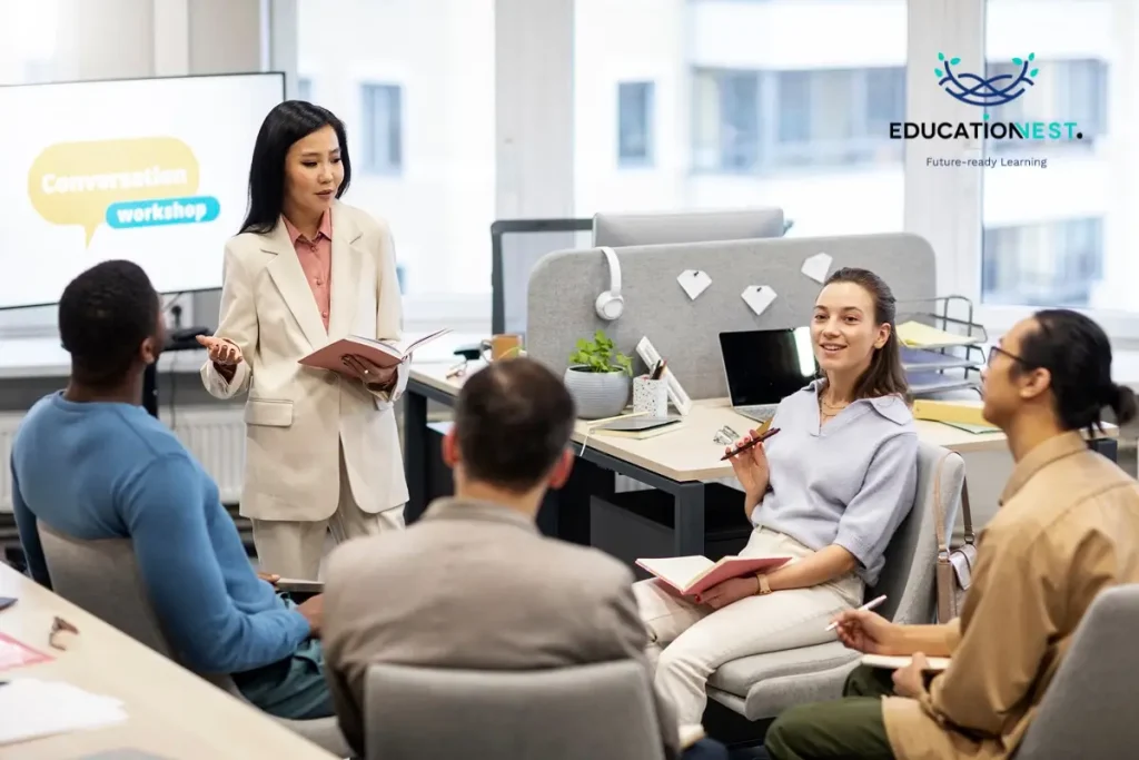 A woman presents to an audience on corporate training's impact on employee well being and development.