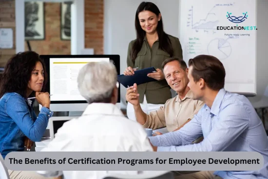 A diverse group of individuals engaged in discussion around a table, highlighting collaboration in employee development programs.