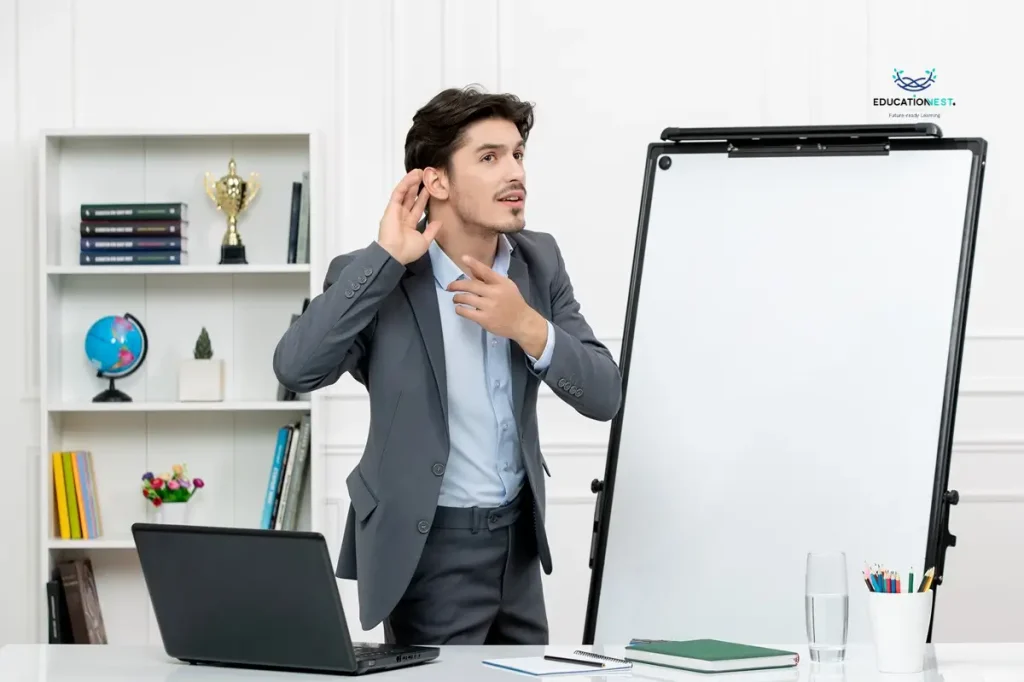 A man in a suit listens intently, symbolizing effective communication in professional upskilling strategies.