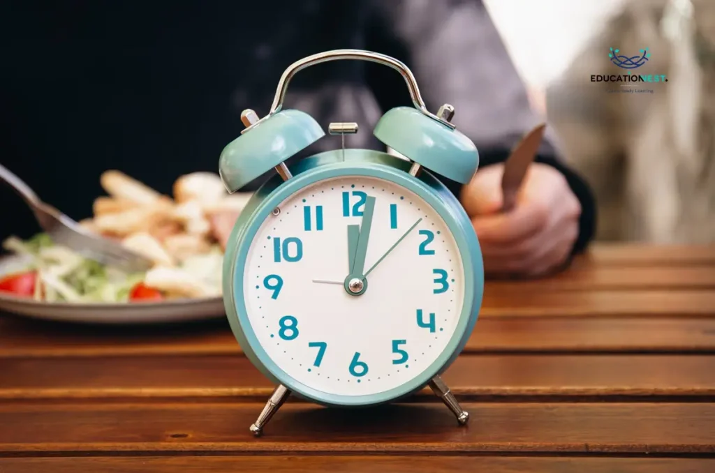 A person enjoys a fresh salad while an alarm clock sits on the table, symbolizing focused productivity with the Pomodoro Technique.