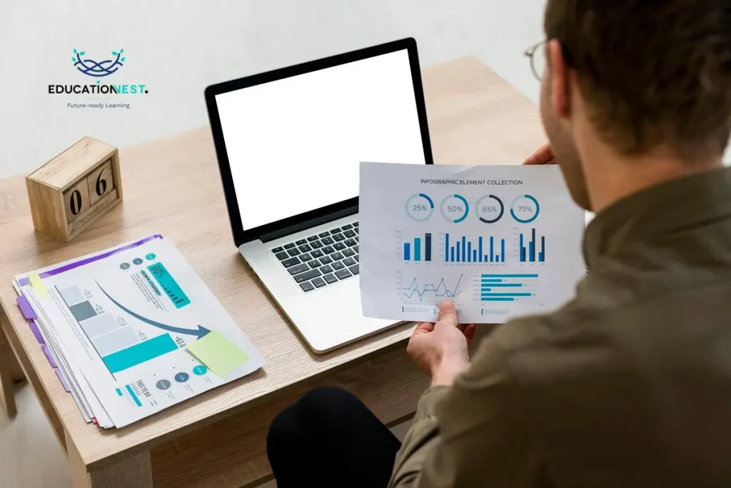 A man examines paper graphs on his desk, showcasing how Power BI improves business decision-making through data visualization.