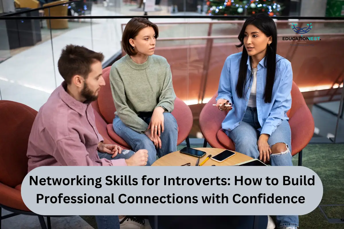 Three individuals engaged in discussion around a table, utilizing a laptop to enhance their networking skills.