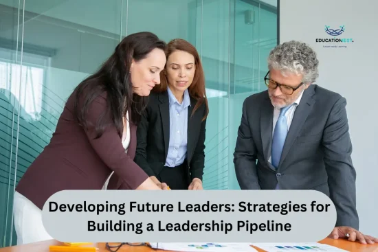 Three individuals in business attire examining a document, discussing strategies for building a leadership pipeline.