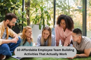 Young adults gathered on grass with laptops, showcasing a collaborative atmosphere for team building activities.