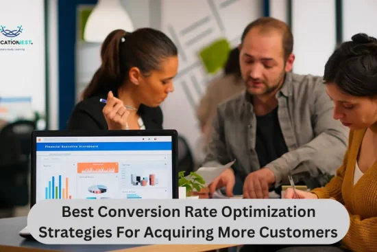 Three individuals collaborate at a table, focused on a laptop, discussing conversion rate optimization strategies.