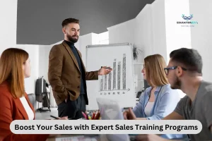 A man presents to colleagues, promoting expert sales training programs to enhance their sales skills and strategies.